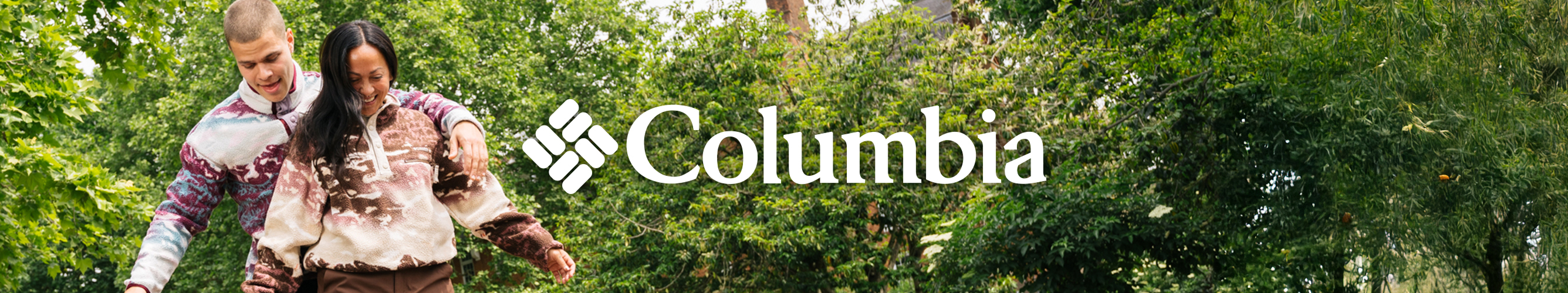 man en vrouw in truien van columbia