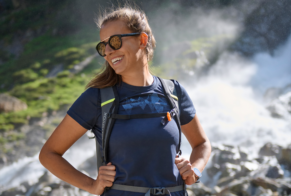 dame in maier sports-kleding